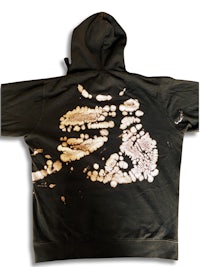 a black hoodie with a gold print on it